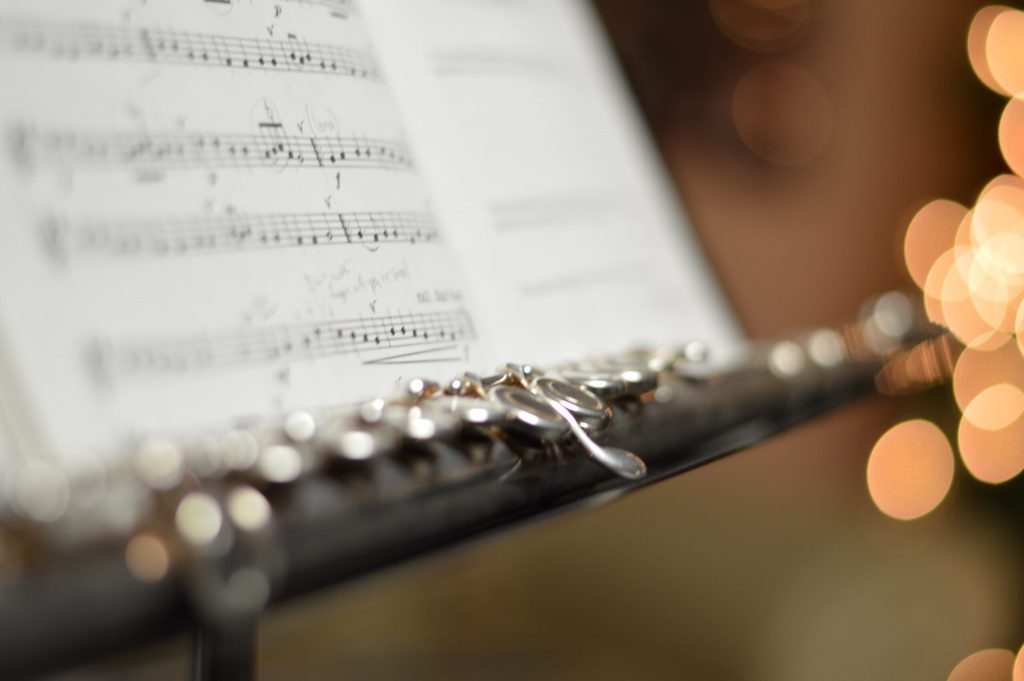 sheet music notation with flute orchestra classical music in film