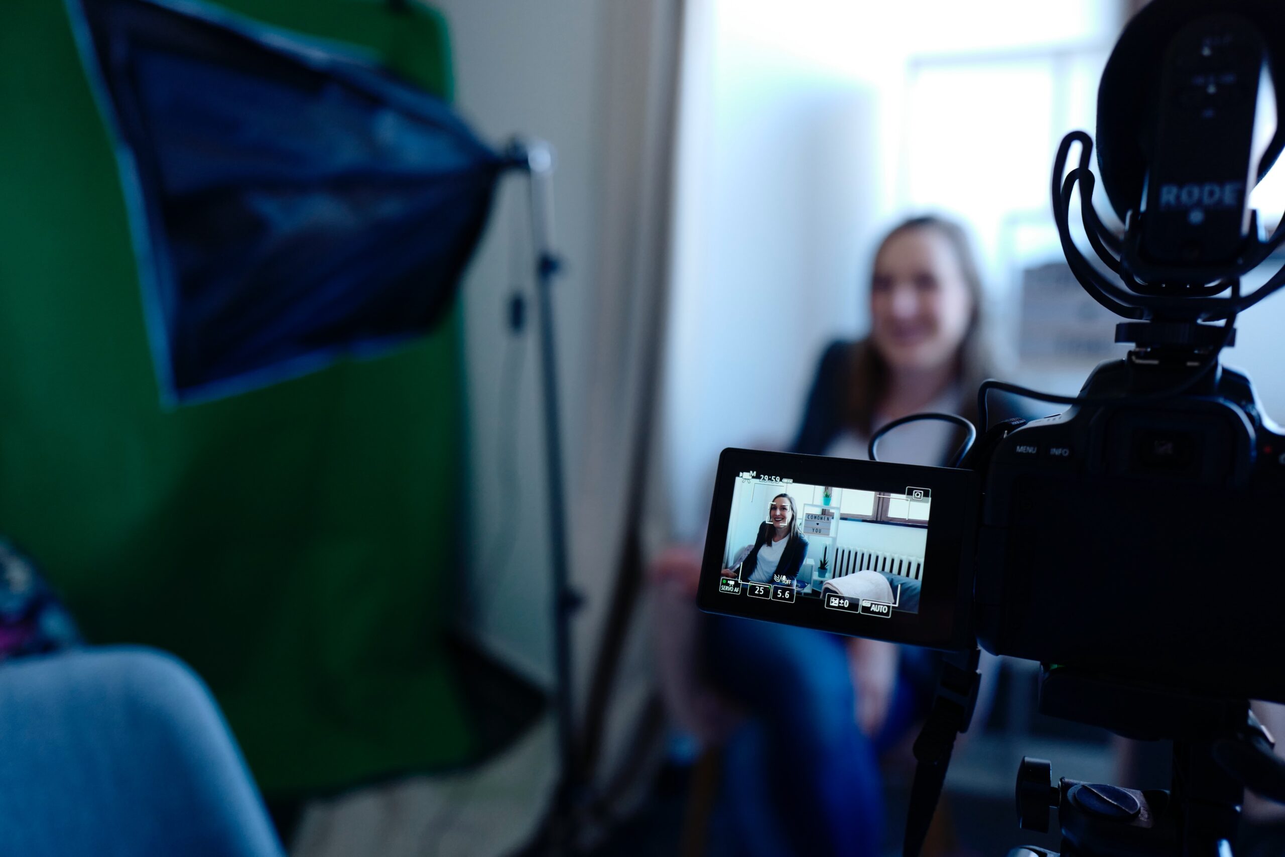 video filming a woman green screen finding background music