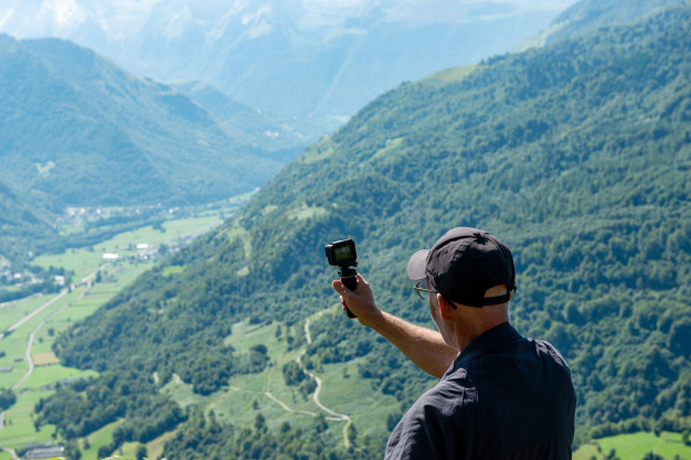 man using action camera